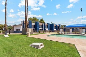 Sundeck with gas grills and corn hole